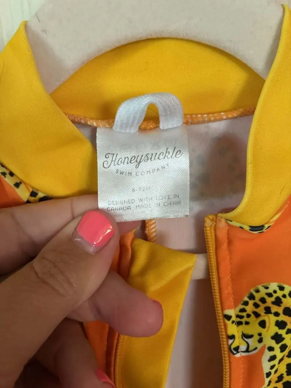 Honeysuckle Swim Company Orange Leopard Print Long Sleeve Swim Romper